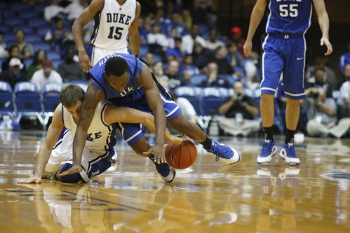 Duke point guards Greg Paulus and Nolan Smith battle for a loose ball in Saturdays Blue-White scrimmage in Cameron Indoor Stadium. Photo by Glen Gutterson/The Chronicle