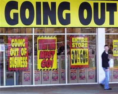 A man walks past a store advertising a sale, on 'Black Friday' ... - Yahoo! New