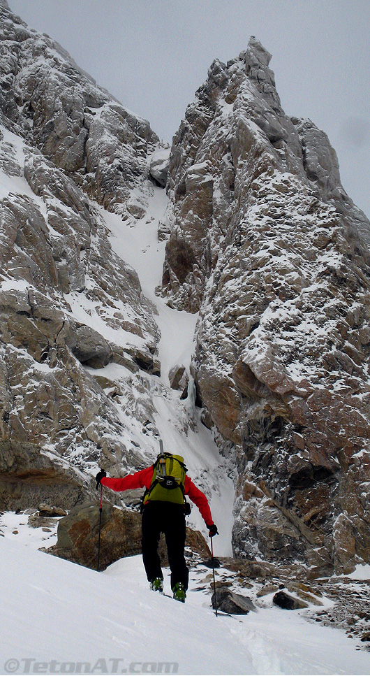 Steve skins in front of Molar Tooth Couloir