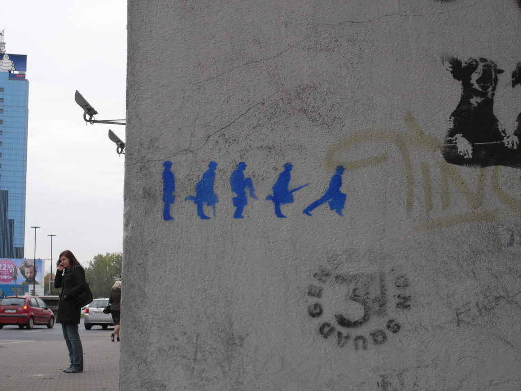Silly Walks stencil graffiti in Warsaw