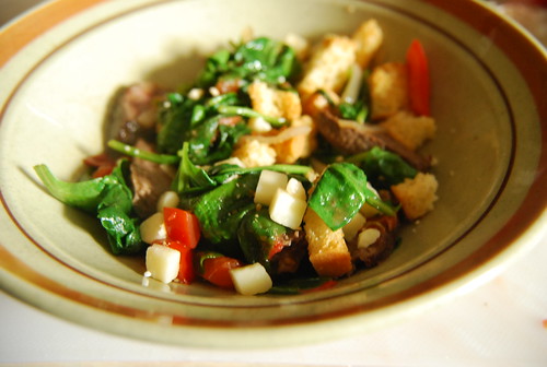 Sauteed sausage, peppers, bread, spinach and cheese