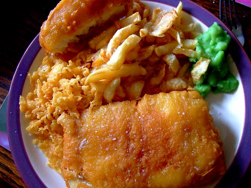 fish and chips takeaway. a lunch of fish and chips,