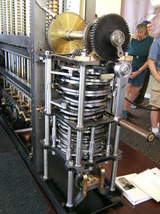 Charles Babbage's difference engine is cranked by hand