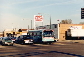 Westbound pre Pace Suburban Transit bus in the southbound turning lane at South Archer and Harlem Avenues. Chicago Illinois. April 1988.