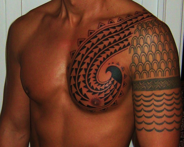 Hawaiian Chest Tattoo-- spears and shark teeth in fish hook pattern designed 