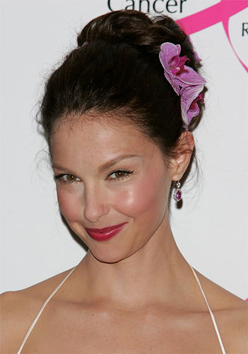 I ran across this photo of Ashley Judd with a purple exotic flower in her