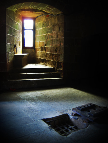 The hatch of a prison set into the floor in the Castle of Fougères, France.