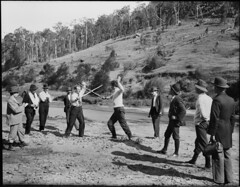 A group of men watching two men fencing by Powerhouse Museum Collection