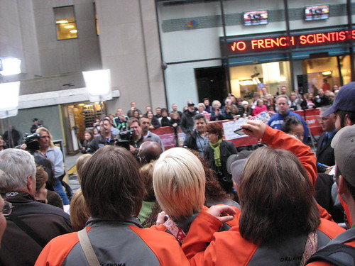 People hoping to be seen on the Today Show's outdoor segments.  Notice the cameramen and the back of Willard's bald head.
