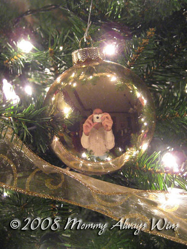 Self portrait in an ornament...in my pajamas