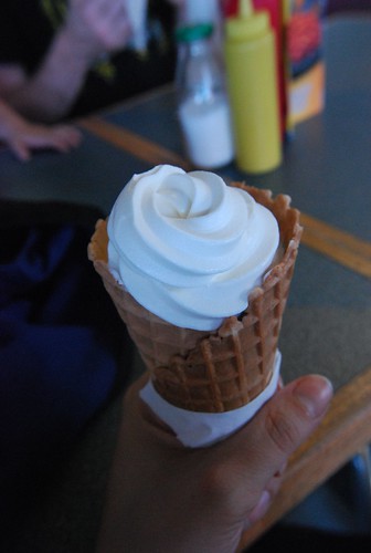 Vanilla soft serve in a waffle cone