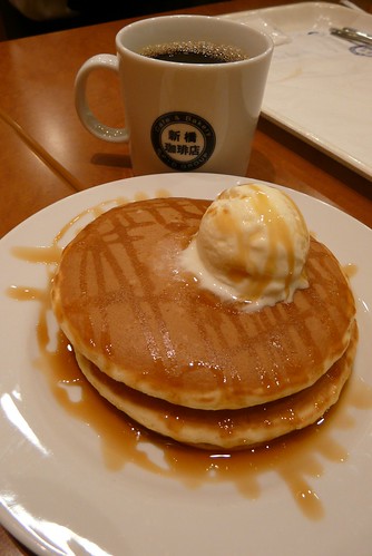 caramel pancakes and a cup of coffee