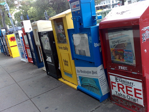 Newspaper boxes stretching from Dupont Circle to the Balitmore Sun