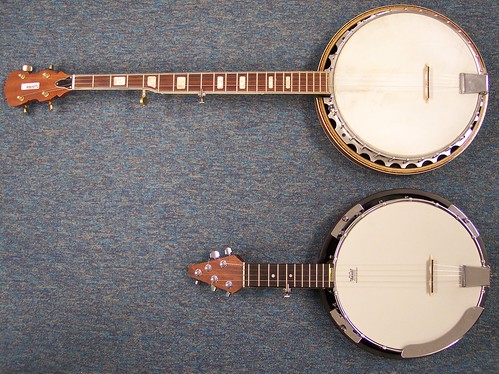 Comparing J.R.'s sawed-off banjo to a standard 5-string banjo.