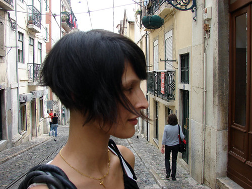 Angled bob hairstyles often appear softer and more feminine than their blunt 