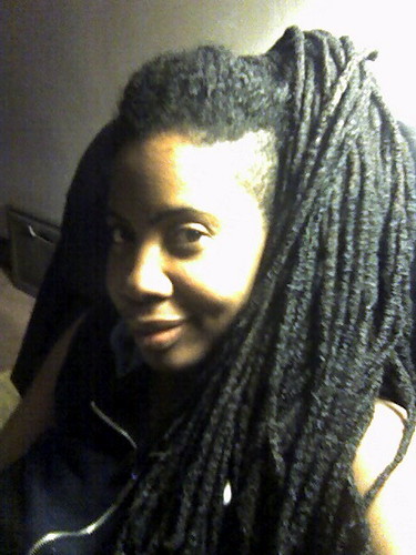 Here are my dreadlocks up in a draping 'pony' tail, with the unlocked front 