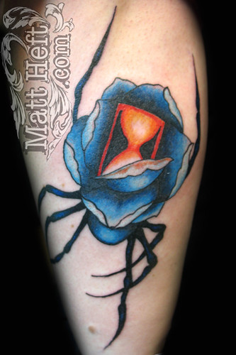 Blue red and Black Widow Rose Tattoo, this is not tribal tattoo