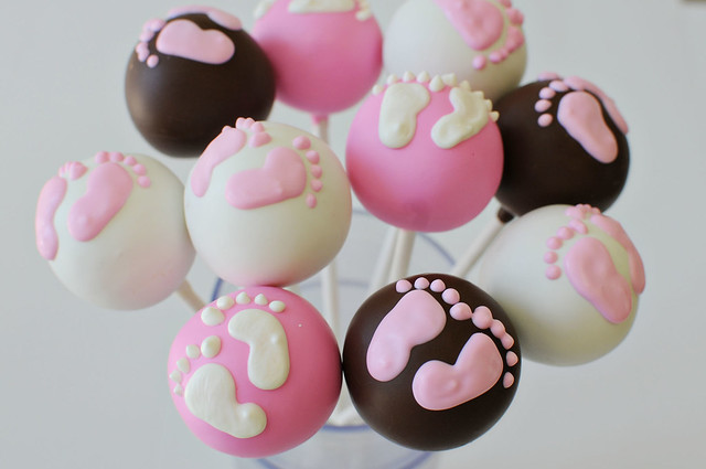 pink, white and brown baby feet cake pops