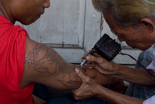 Street tattoo in Rangoon, Burma.
