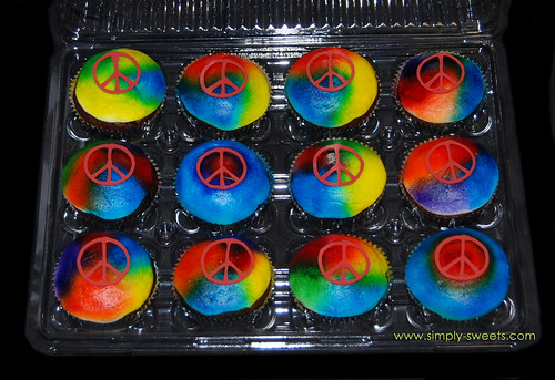 Tie dye and peace signs cupcakes