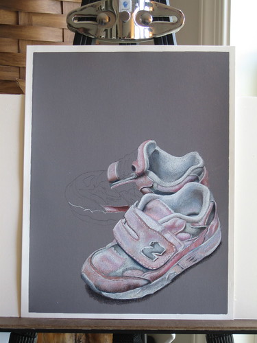 Photo of in progress colored pencil drawing of two pink sneakers.