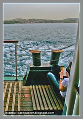 Reading Book Aboard Bosphorus Ferry Cruise at Istanbul