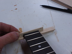 ...to indicate the top of the fretboard...