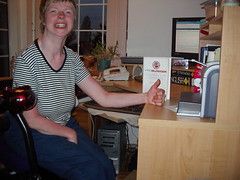 Glenda giving the ProBlogger book a thumbs up