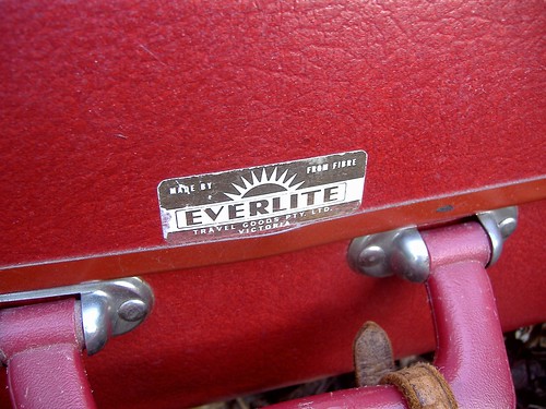 red suitcase (tag)