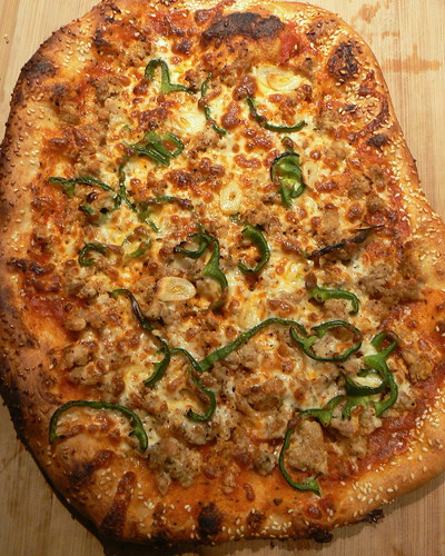 Pizza with sausage, garlic and poblano pepper