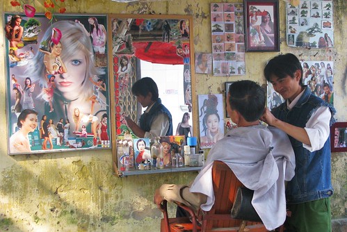 Stylish sidewalk barbershop, Nimh Binh, Vietnam