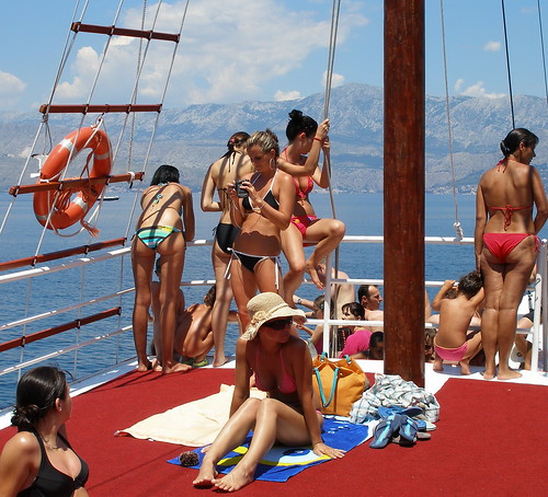 Girls wearing bikini on a ship
