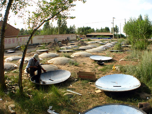 Solar cookers being assembled near Minlou, Gansu Province, China