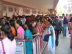 Lauren waits for movie tickets on the ladies' line - Raj Mandir, Jaipur, India