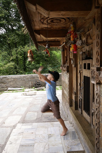 Alec ringing the temple bell