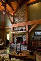 goshen_timber_frames_great_room_with_floor_to_ceiling_fireplace