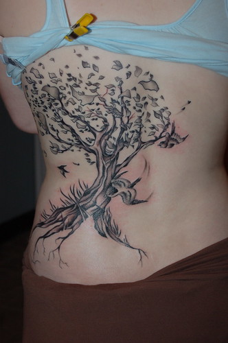 rib tattoo designs. Falling Leaves Tattoo Design