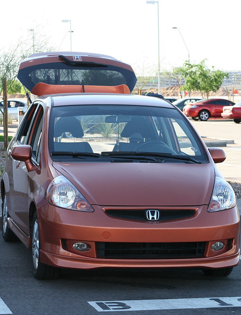 orange car honda fit 2007