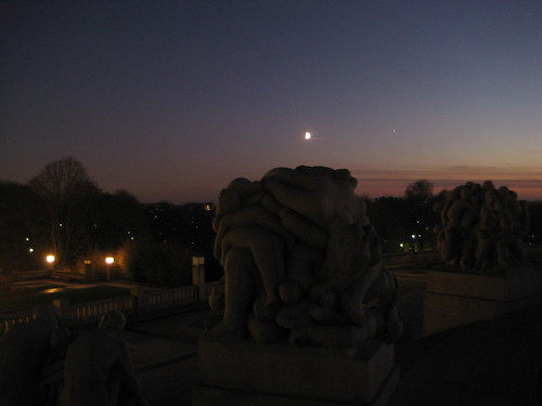 The moon, sunset and Monolith at Frogner Park