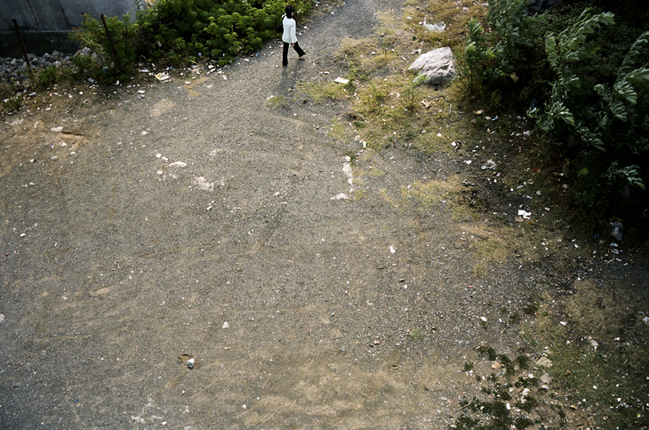 el_294 a woman walking in albania