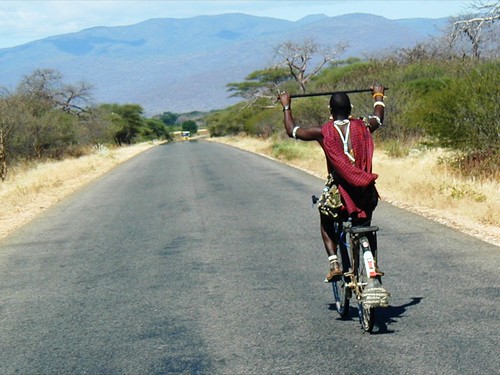 A Maasai celebrating beating me in his own private little race, Tanzania