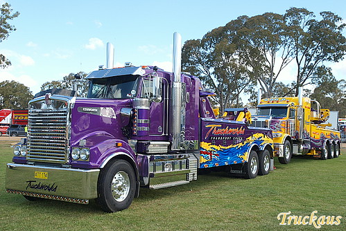 Truckworks Kenworth T908 towing their Peterbilt recovery truck