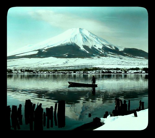 MOUNT FUJI FROM THE DOCK PILINGS -- The Lone Boatman in Japan's Winter Light (Morning on Lake Yamanaka)