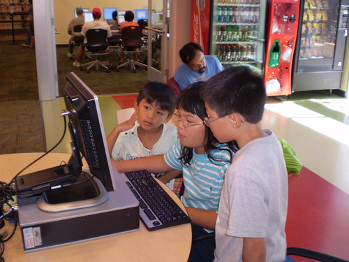 Kids using the computers. by San Jos Library, on Flickr