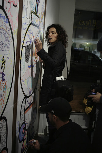 The blank B.U.D.s on the wall get customized live at the opening reception. Edition of 2.