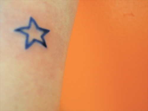 blue star tattoo wrist