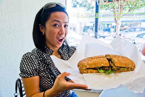 woman holding sandwich