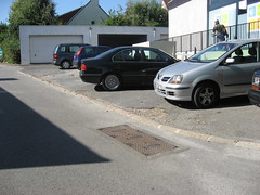 Possible aggregation point - in parking by silver car
