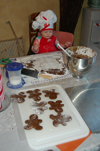 Rolling out Gingerbread Men with Mom