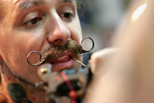 He completed 415 tattoos in 24 hours. (AP Photo/ Dallas Morning News, 